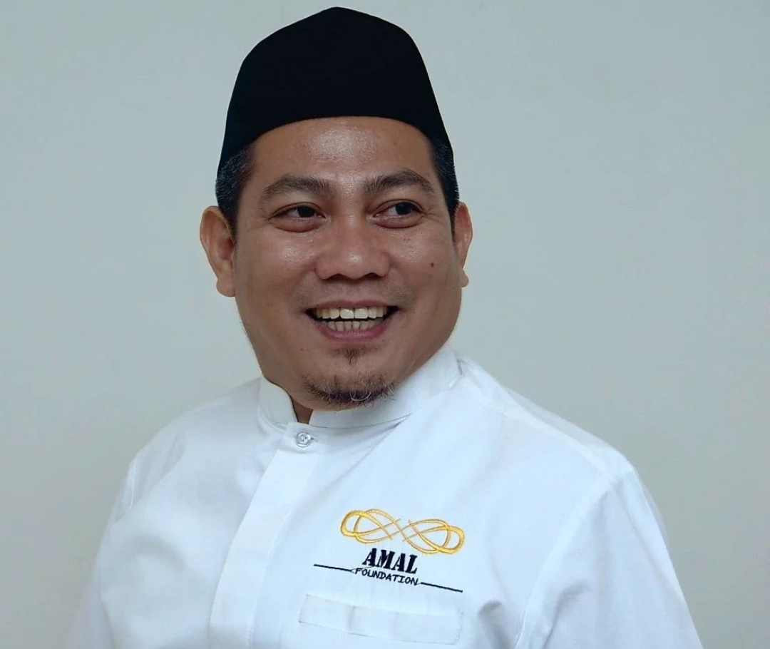 Andi Muzakkir Aqil, SH. MH.