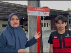 Mahasiswa KKN-T Unhas Pasang Plang Nama Jalan di Kelurahan Lalebata