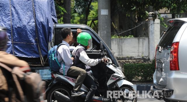 Menimbang Hak Konsumen Transportasi Online